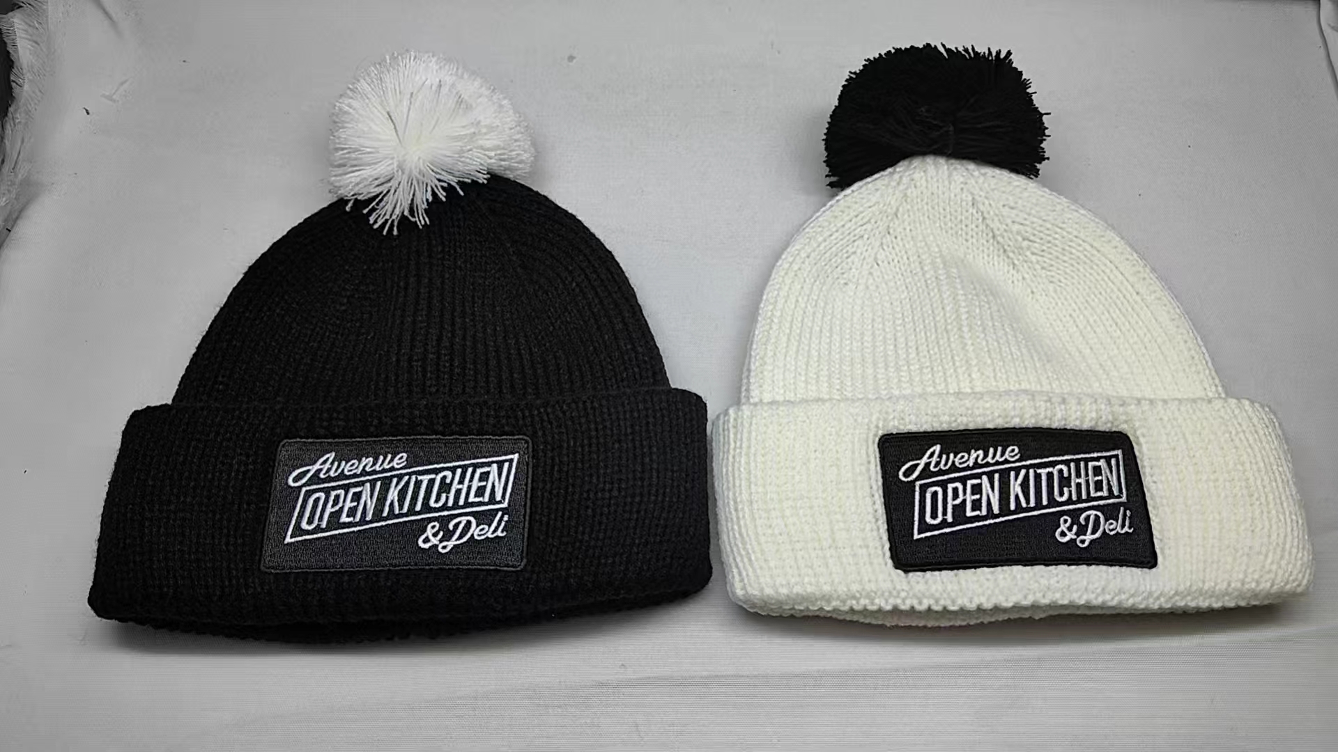 Custom embroidered beanies produced by ViCES Studio for Avenue Open Kitchen & Deli