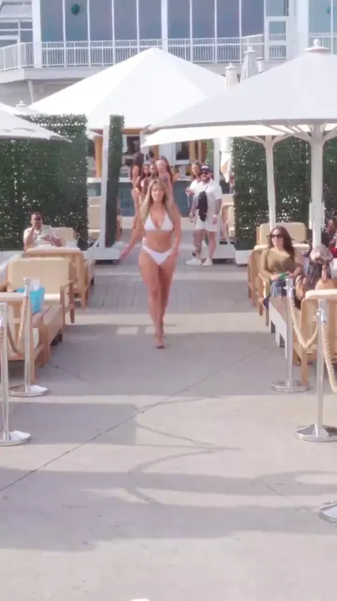 Besh Swimwear runway walk over the water at ViCES Swim Week 2025.