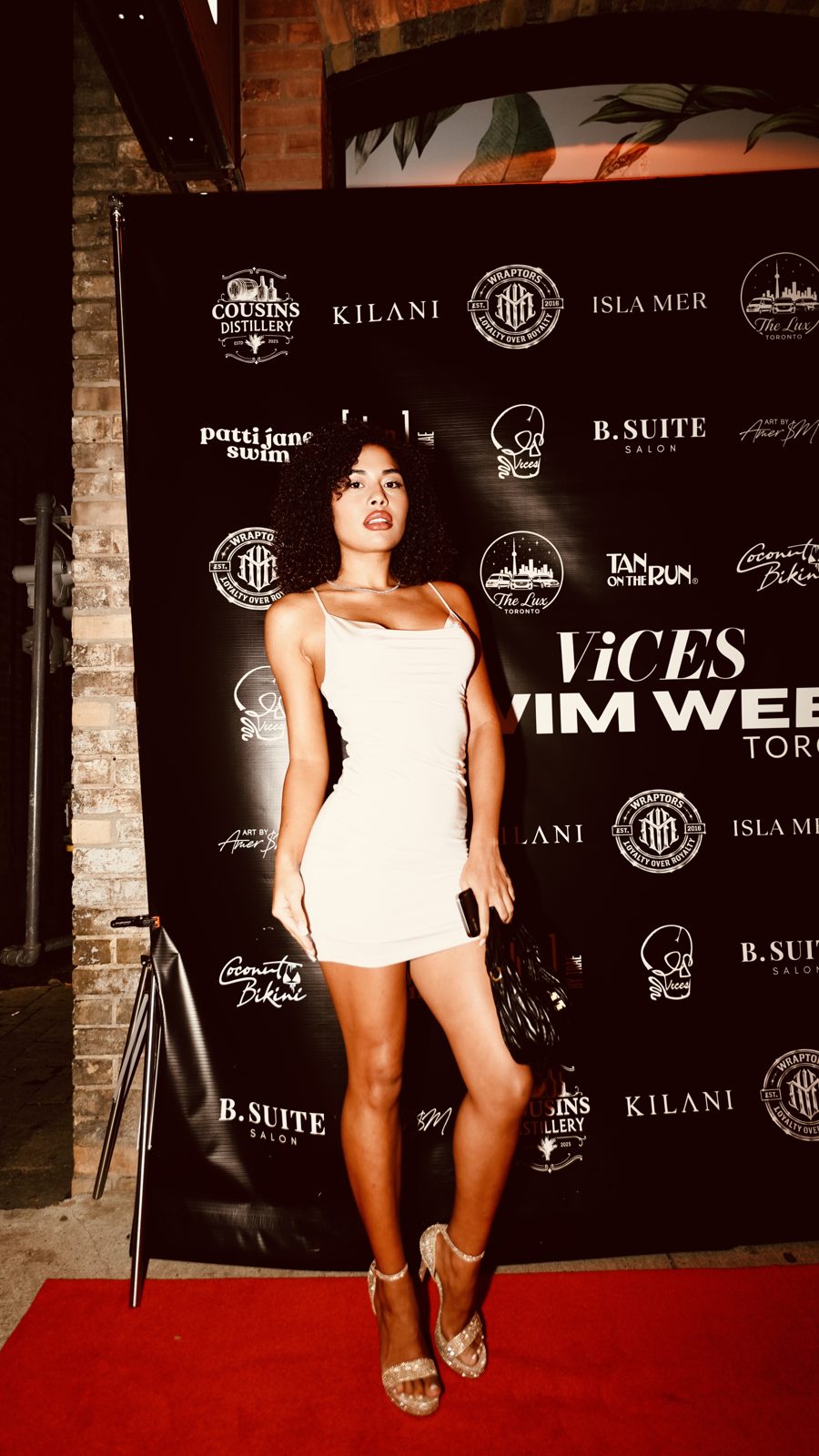 Red carpet portrait at Escobar x ViCES Swim Week 2026