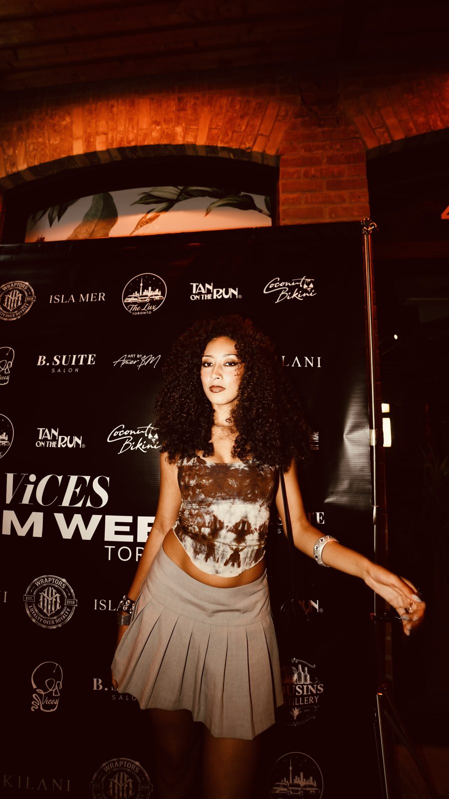 Model on the ViCES Swim Week 2026 red carpet at Escobar Toronto