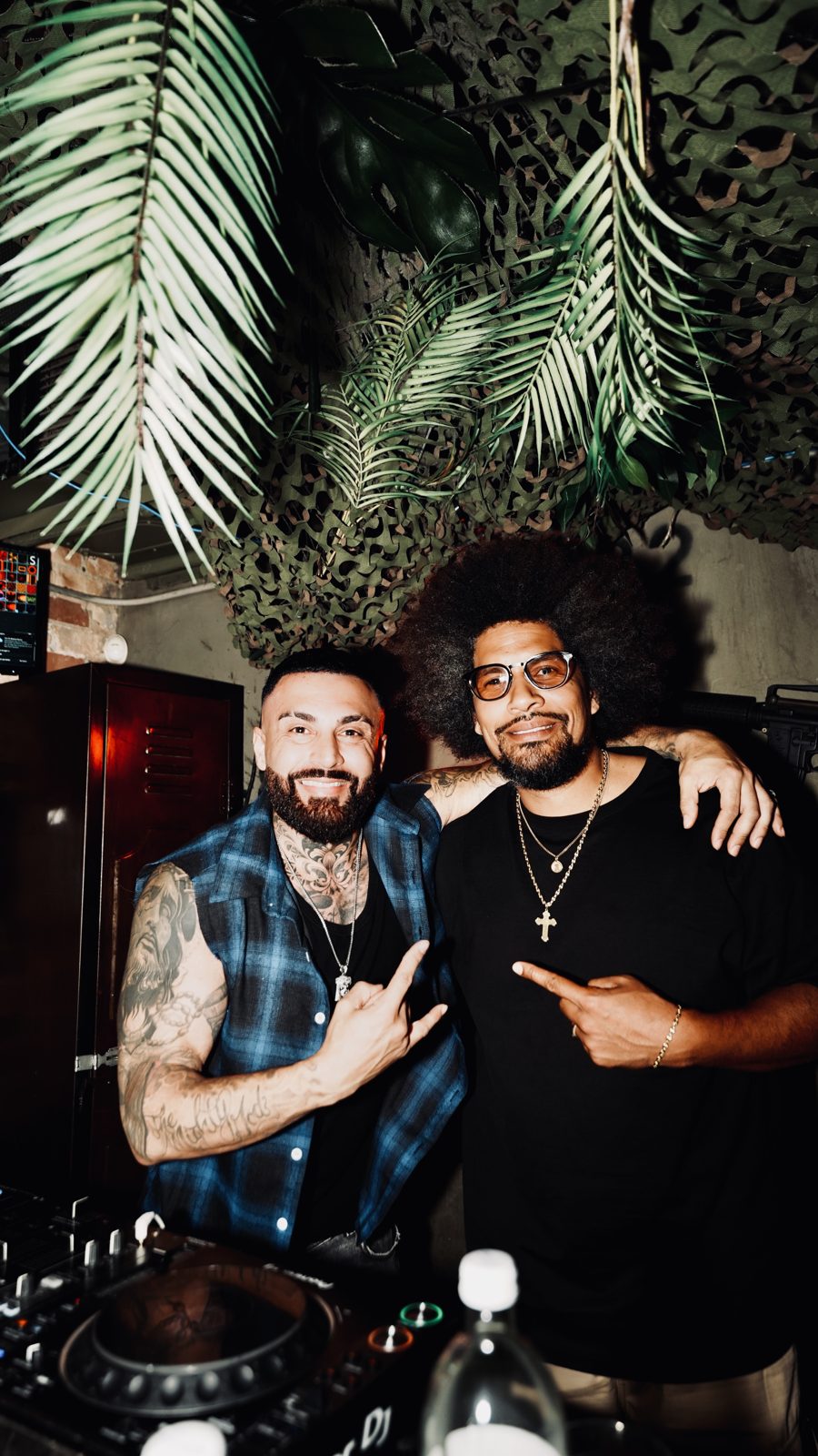 Hosts and DJs behind the booth at Escobar x ViCES